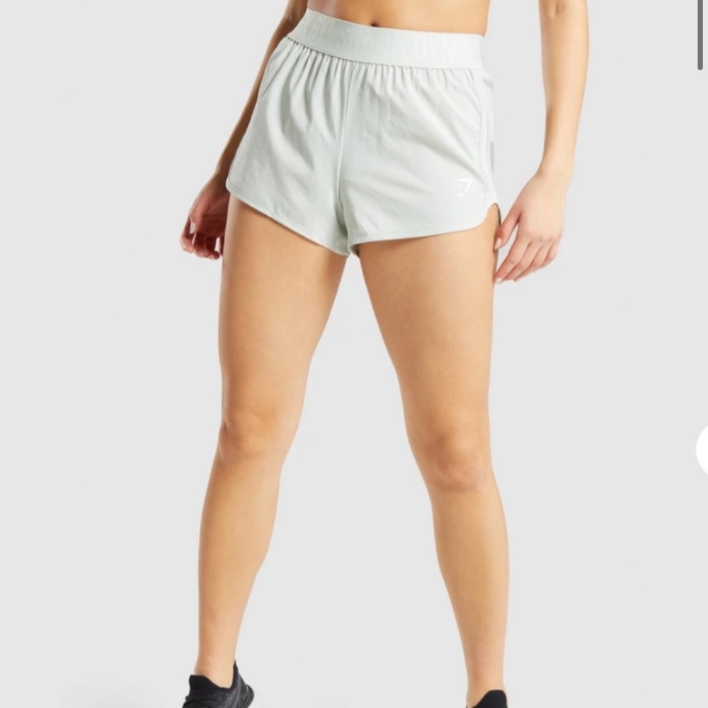 Gymshark training loose fit shorts in light green